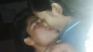 Teen couple kissing 
