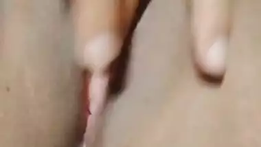 Hot girl fingering her pussy