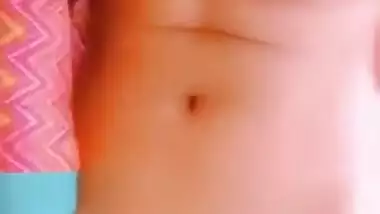 Desi wife shows off small breasts and hairy cunt in online XXX show