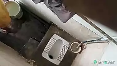 XXX clip of village aunty taking bath in outdoor taken on her son