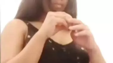 Chubby shy Indian girl showing round boobs to lover
