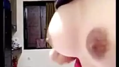 Teen Indian sets the camera on and starts her XXX striptease show