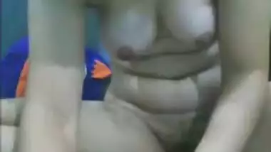 Andhra doodhwali aunty showing tits while...